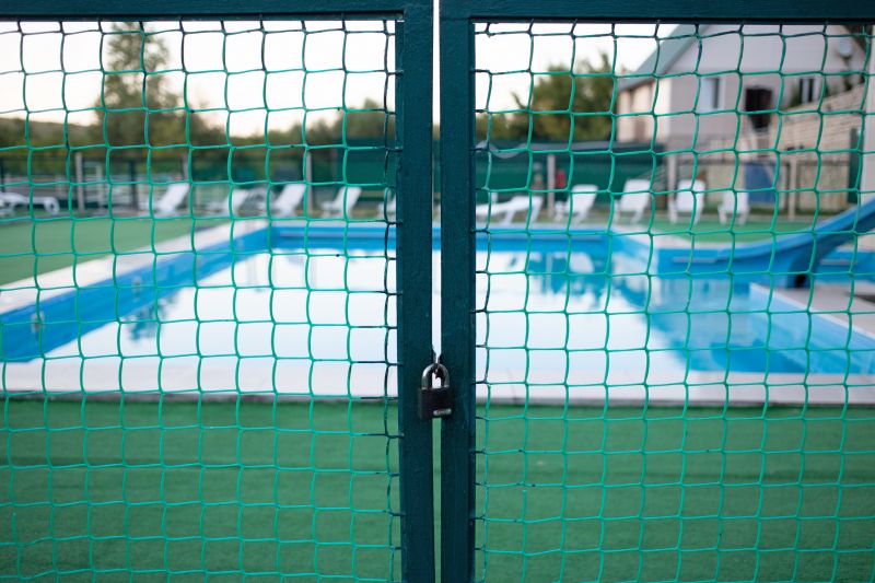 Mesh Fence Securing Pool Area