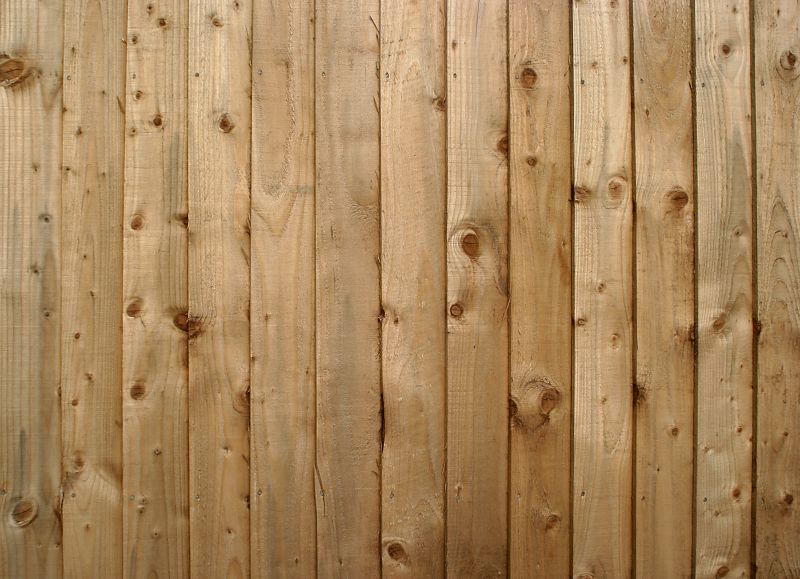 Wood Plank Fence Installation
